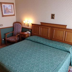 Kamer met een Queen Size Bed